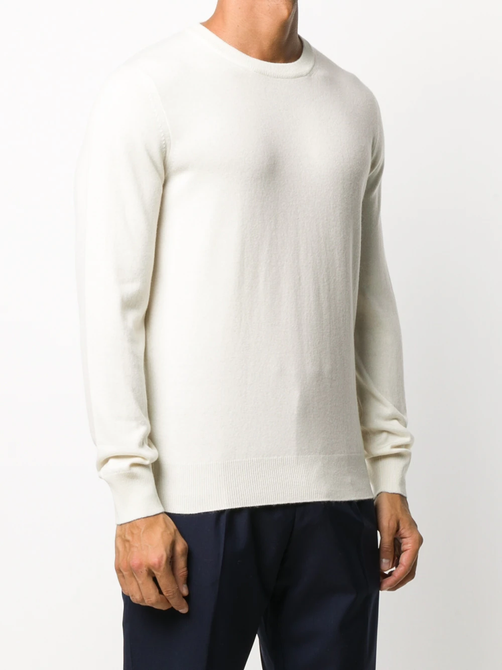This photo shows a beige pullover by Brunello Cucinelli in the old money style.